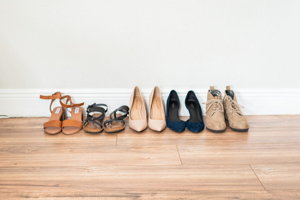 various types of shoes in wardrobe