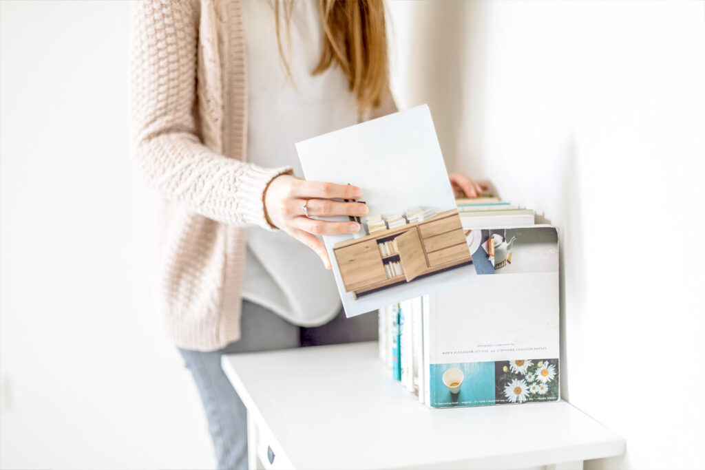 organizing books on a self