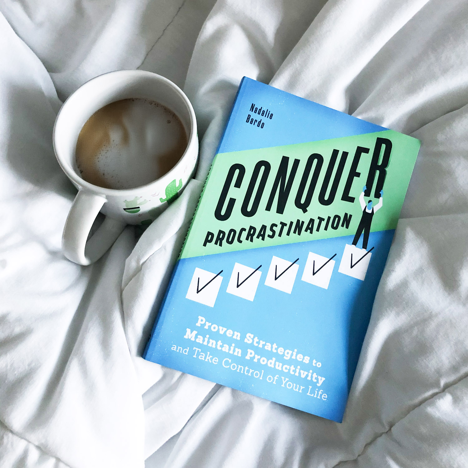 Conquer Procrastination Book with Coffee