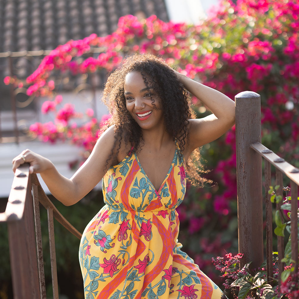 Nadalie on the Stairs smiling happily.